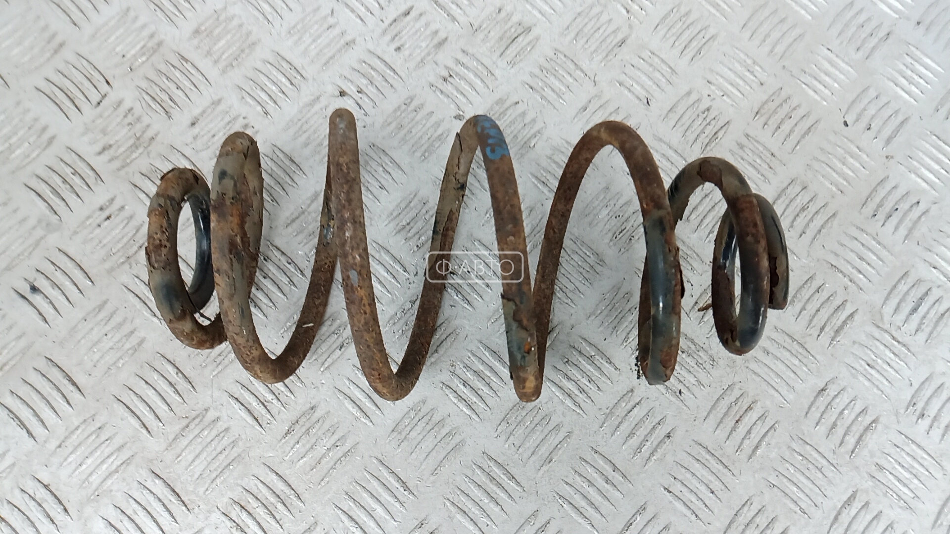Пружина задняя