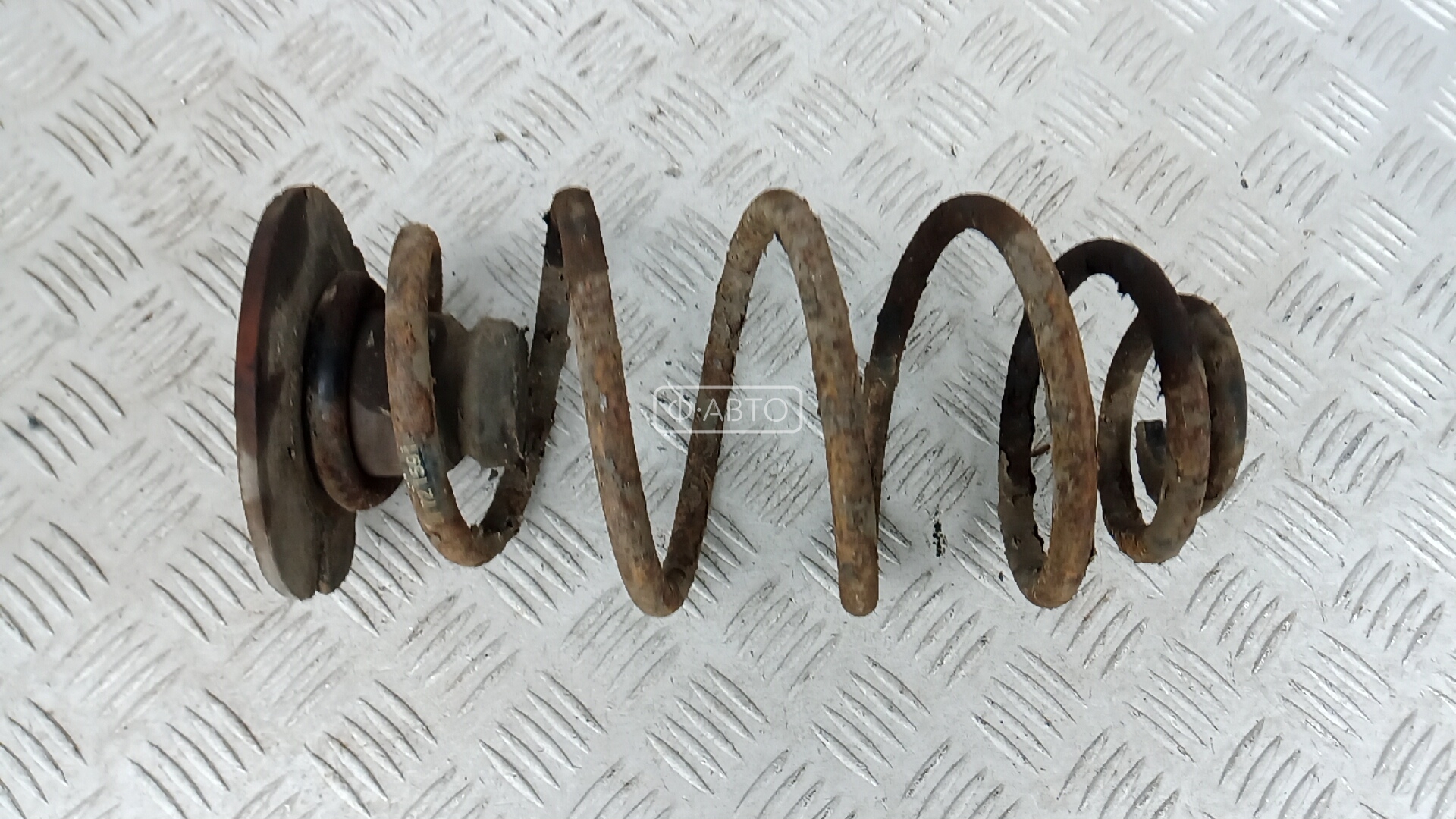 Пружина задняя