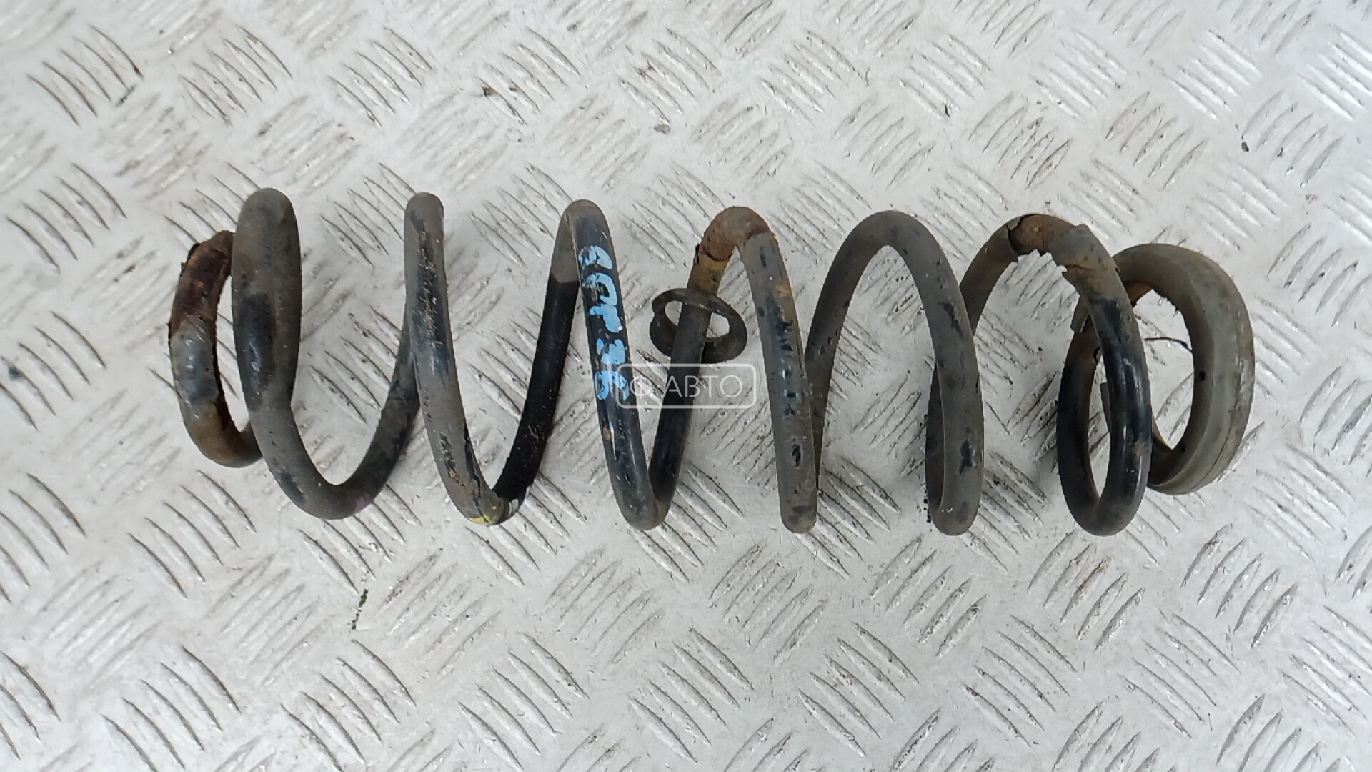 Пружина задняя