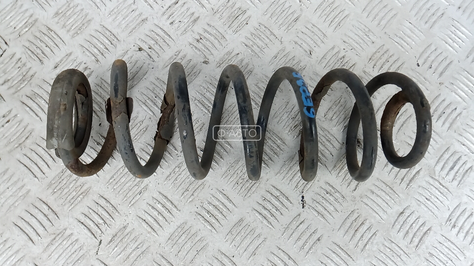 Пружина задняя