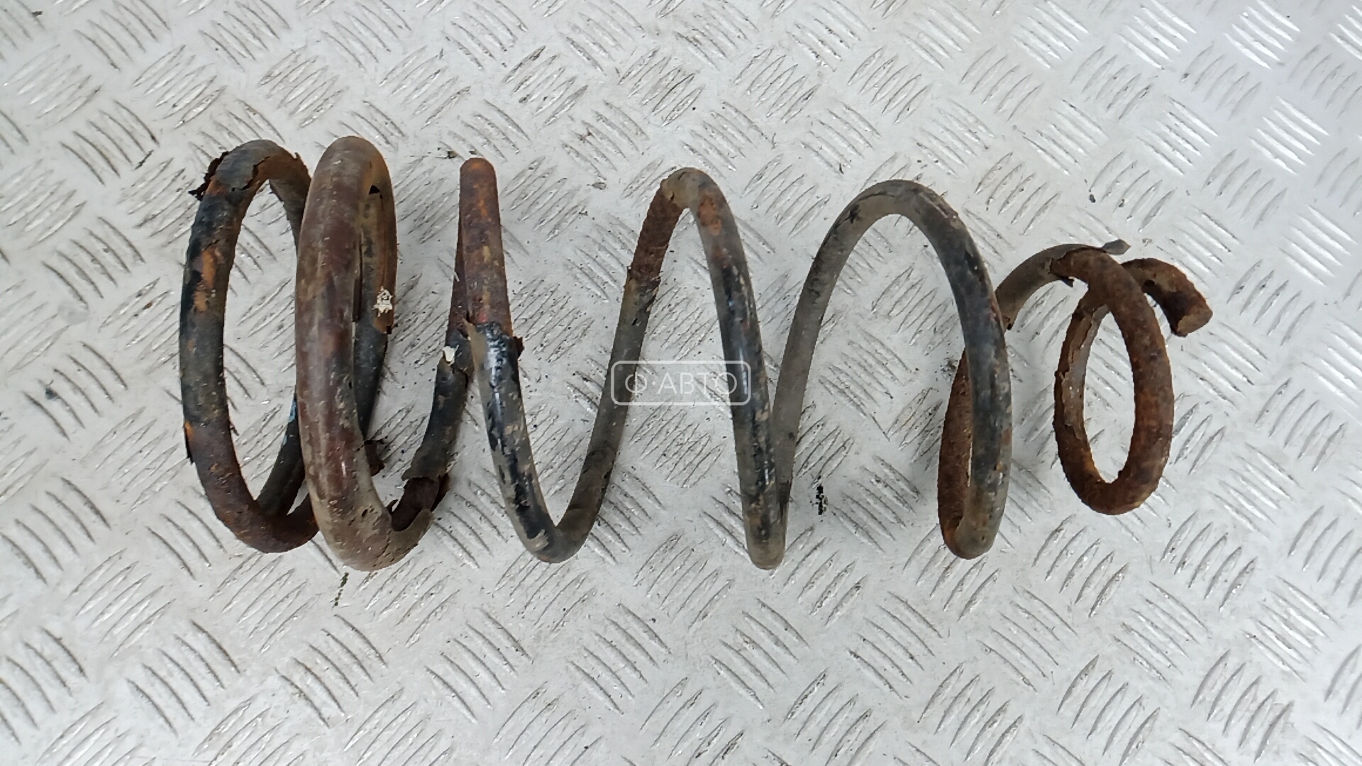 Пружина задняя