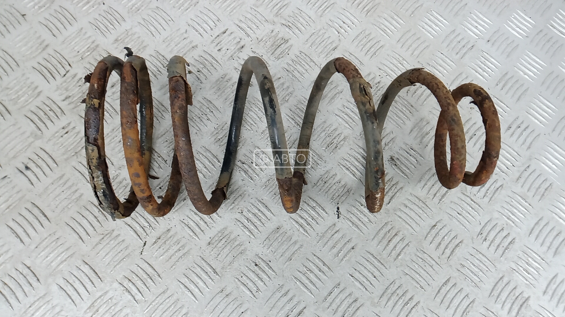 Пружина задняя