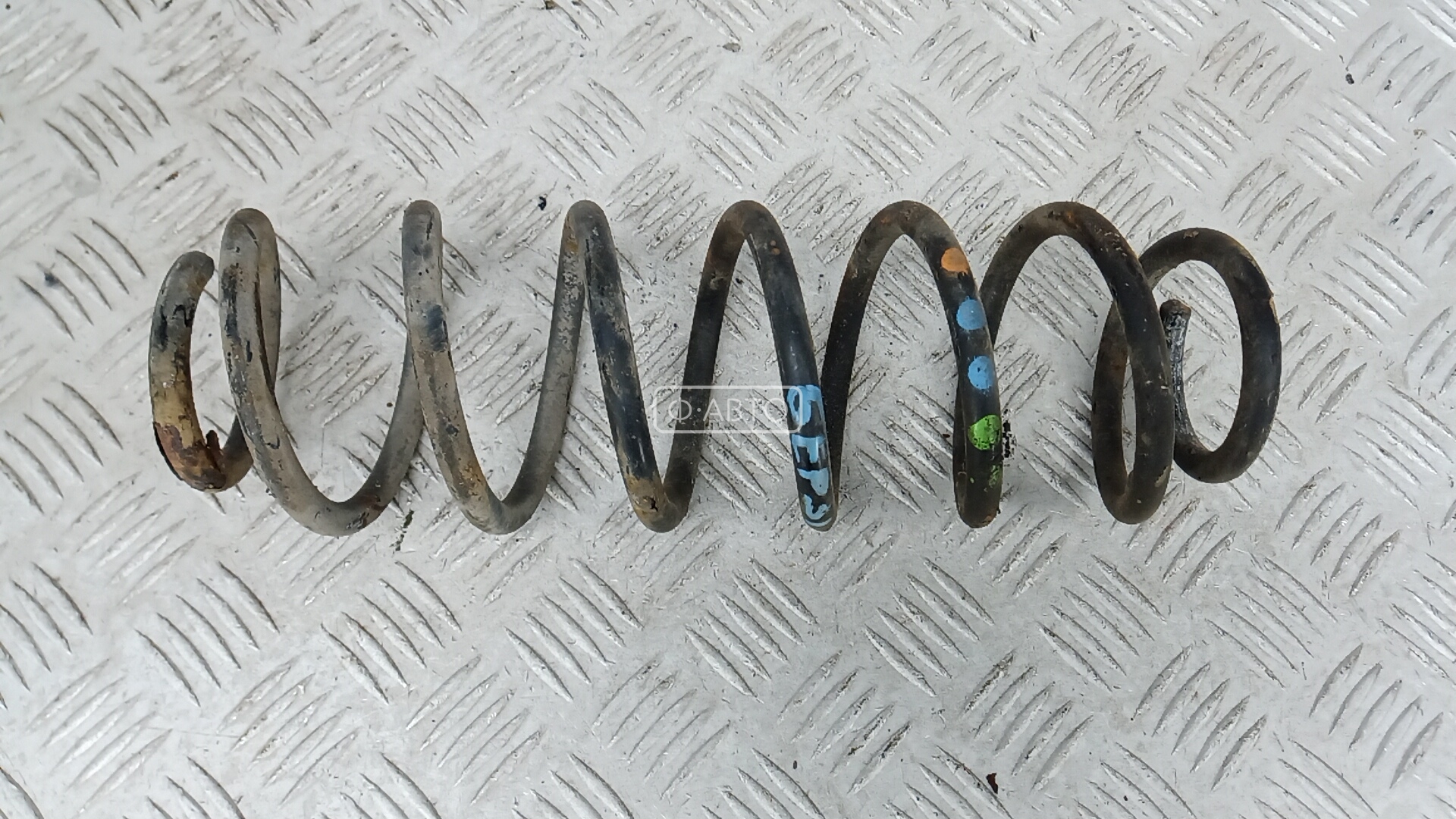 Пружина задняя