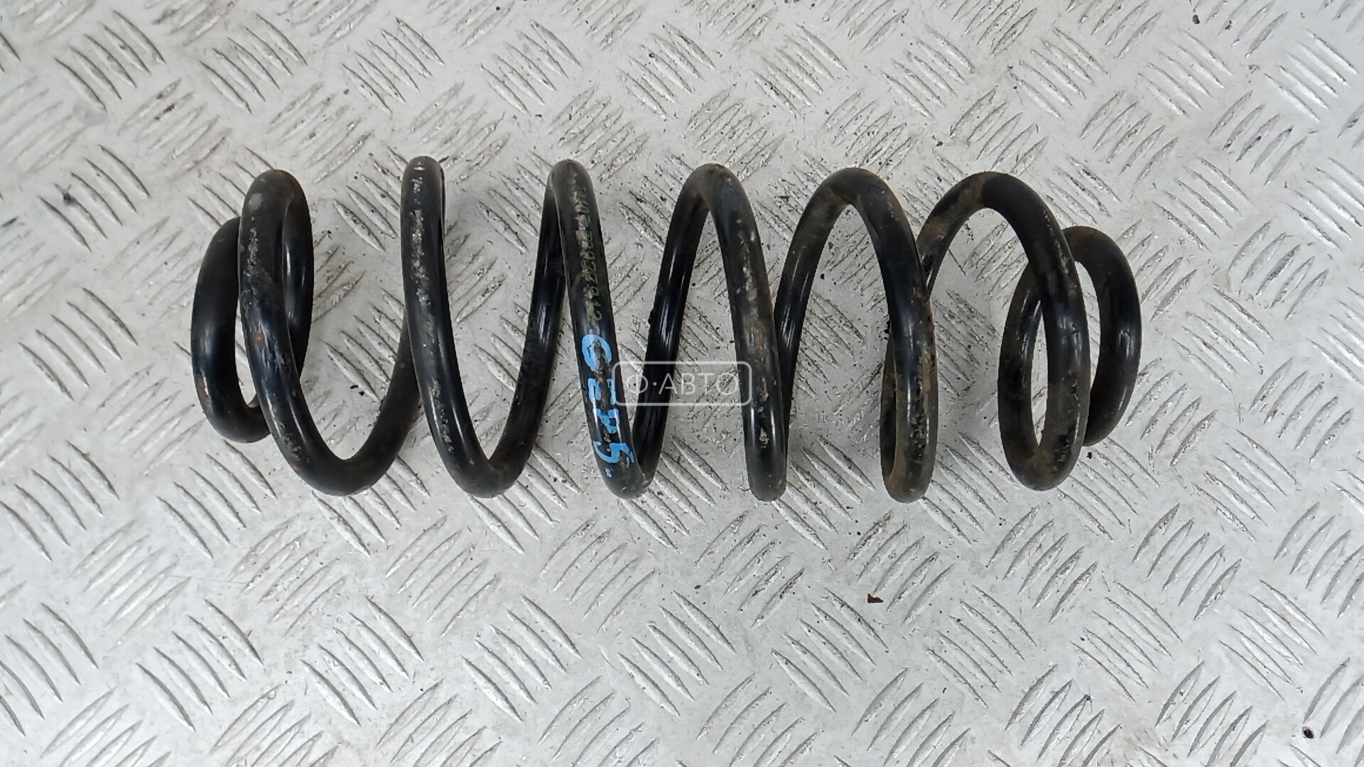 Пружина задняя