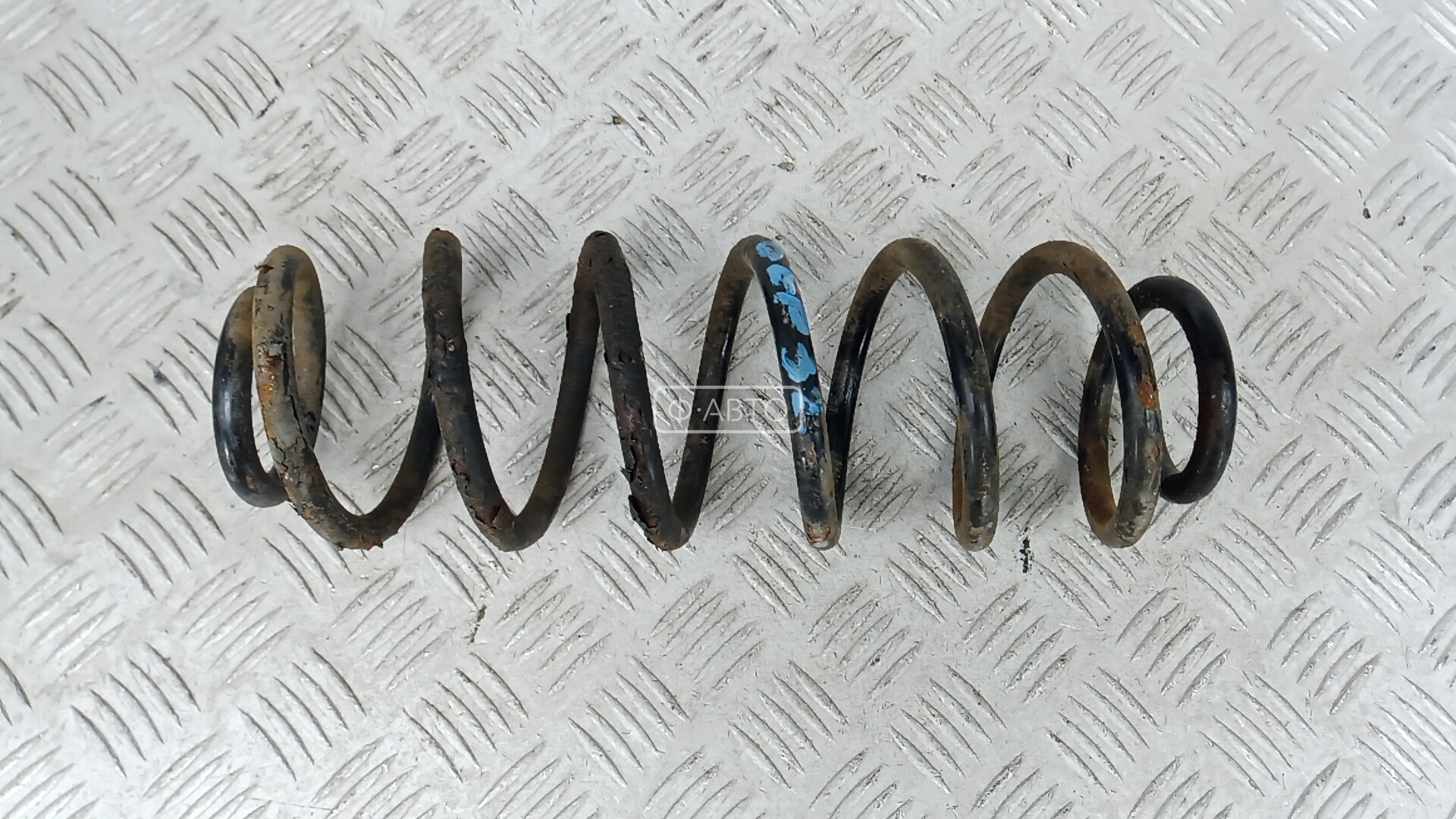 Пружина задняя