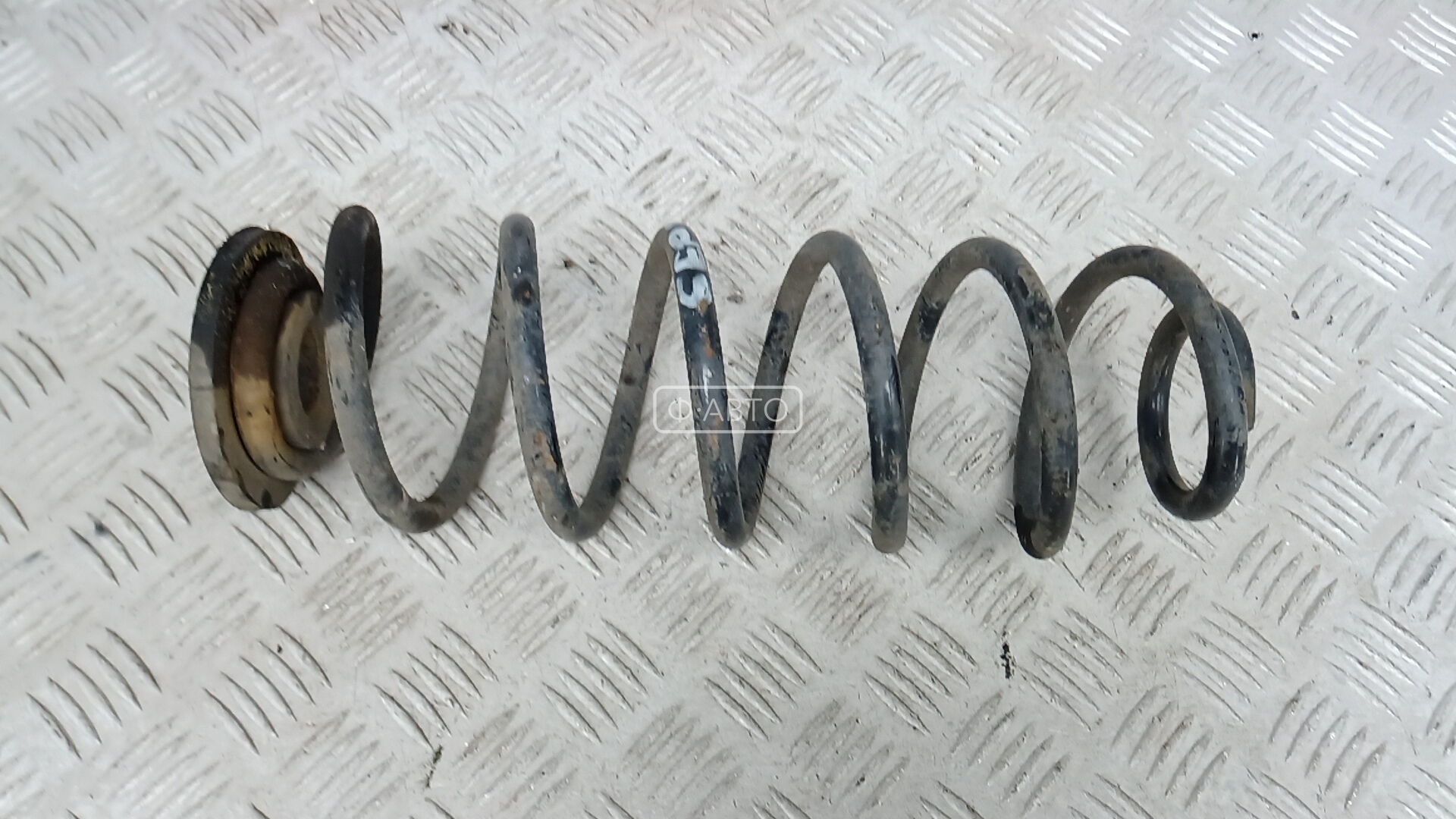 Пружина задняя