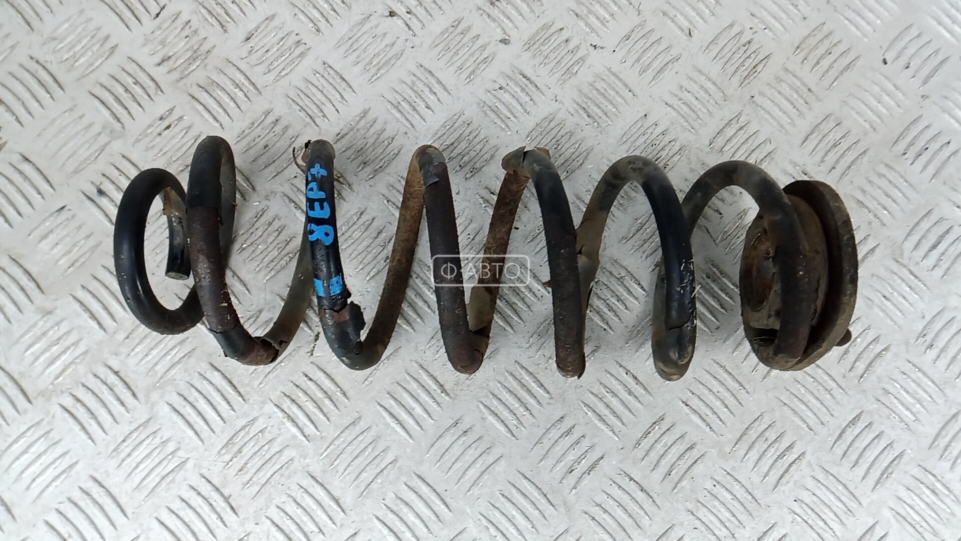 Пружина задняя