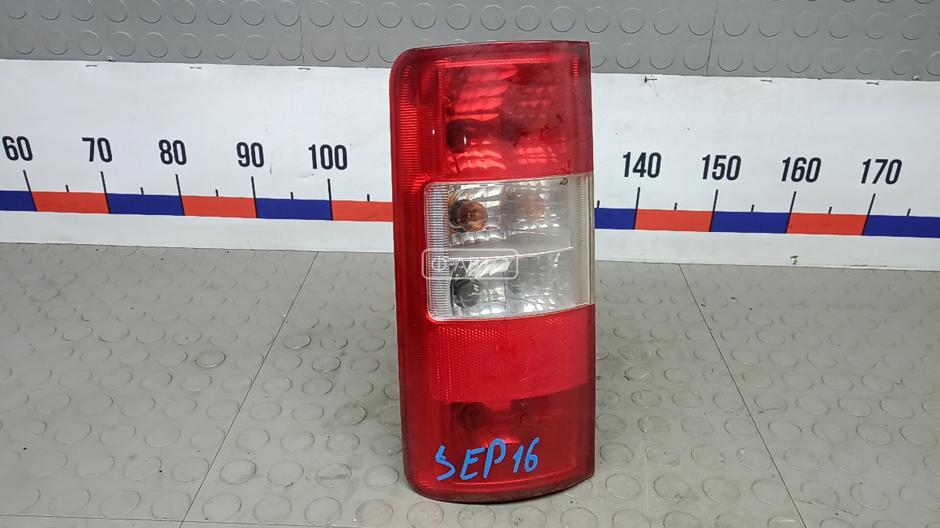 Фонарь задний левый