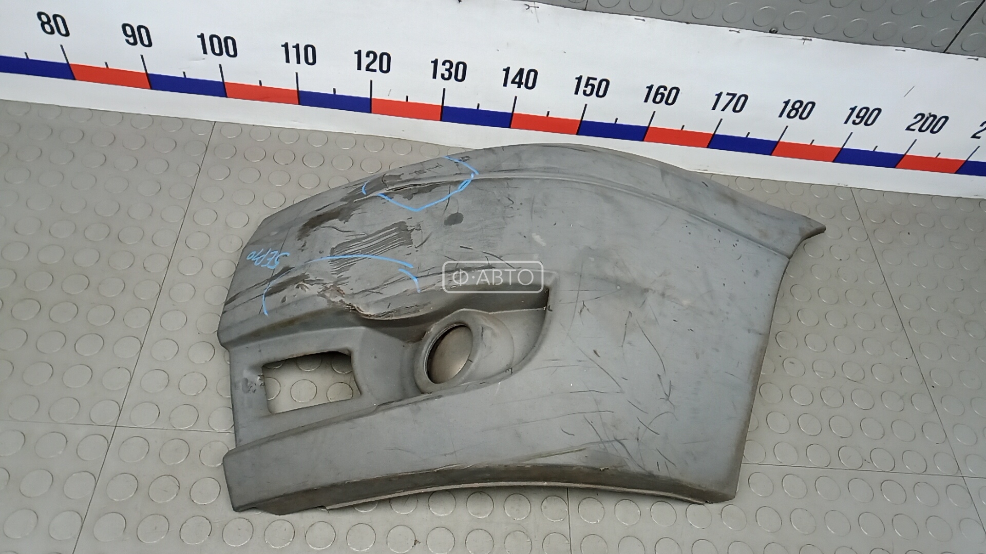 Клык бампера передний левый