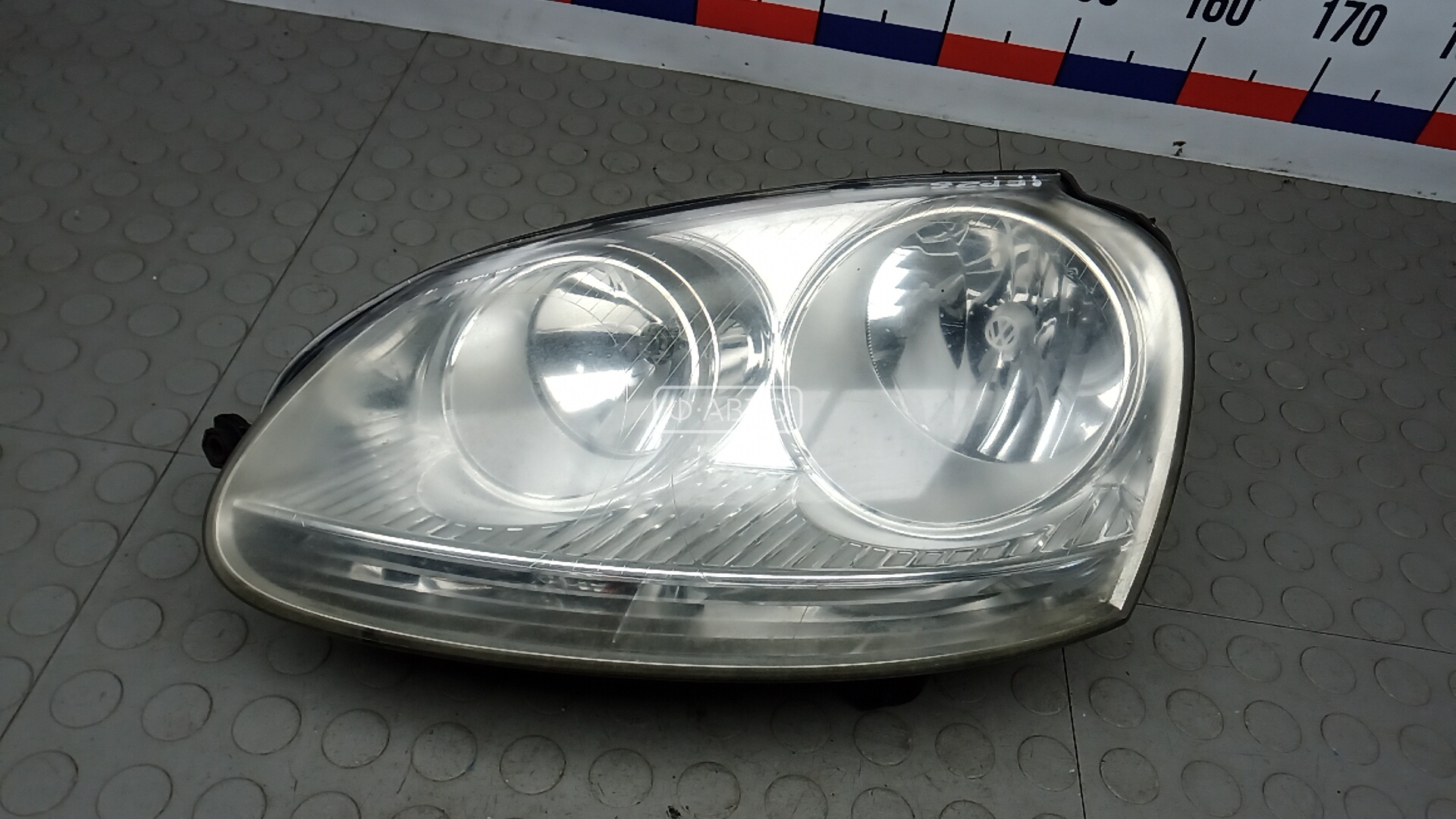 Фара левая VOLKSWAGEN GOLF 5