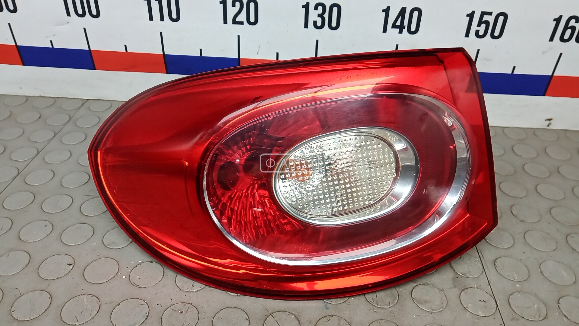 Фонарь задний левый