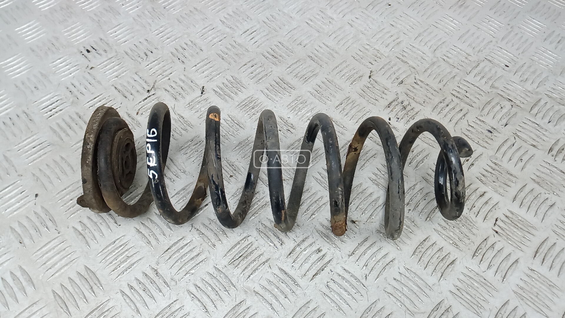 Пружина задняя