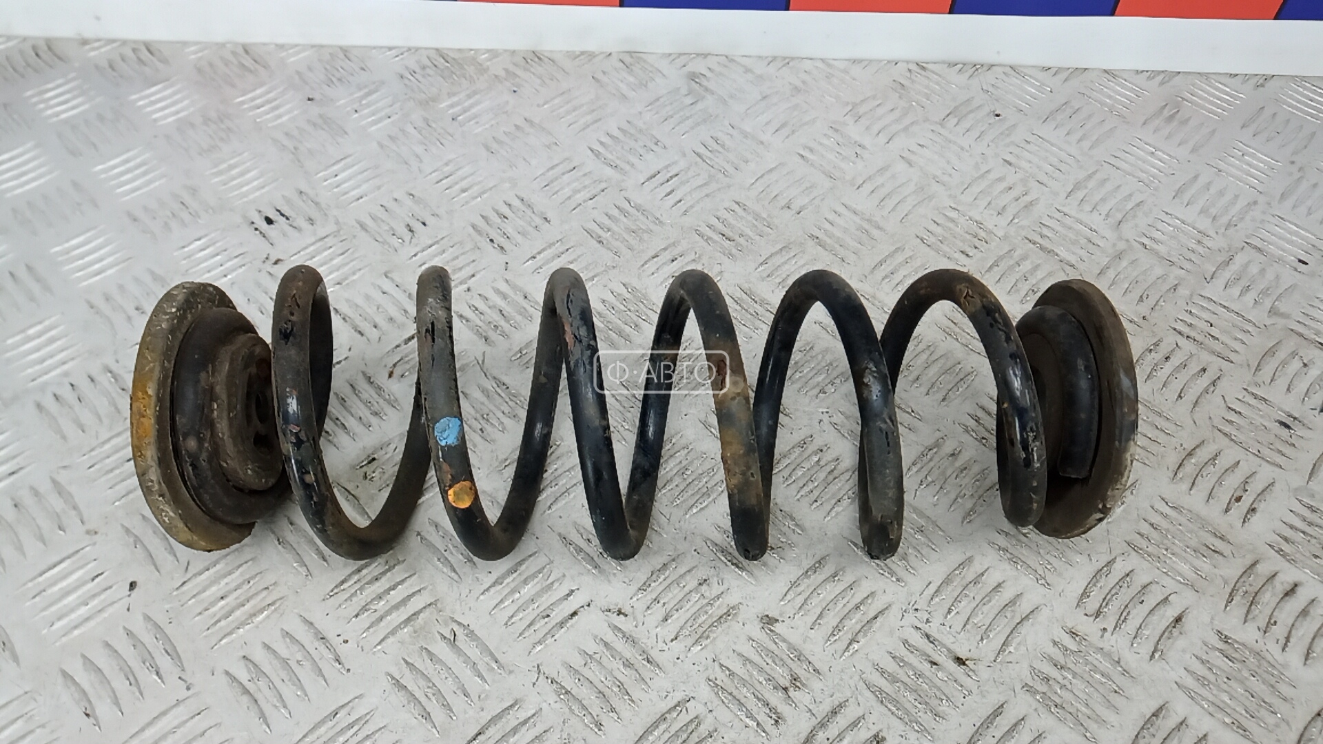 Пружина задняя
