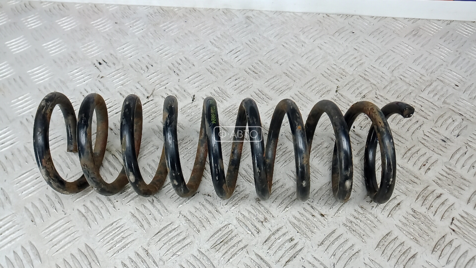 Пружина задняя