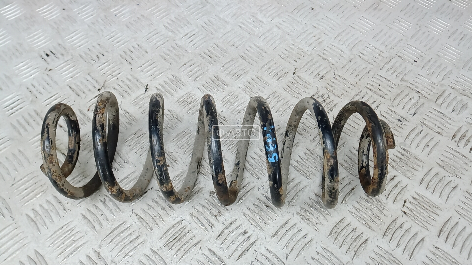 Пружина задняя