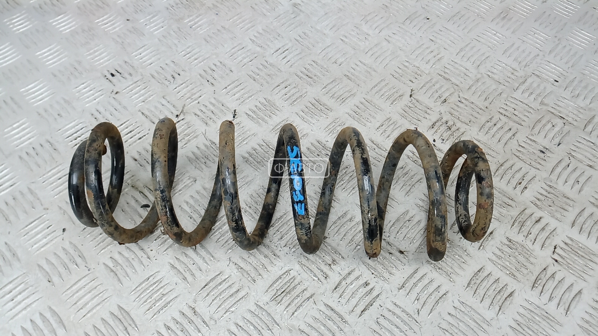 Пружина задняя