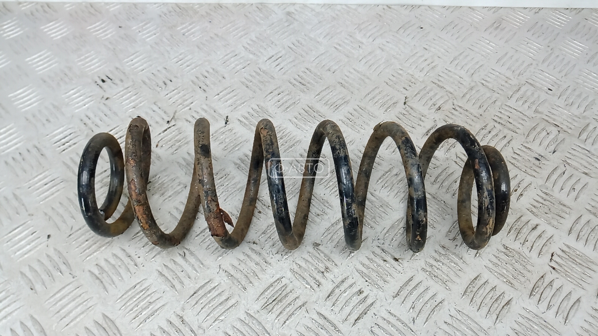 Пружина задняя