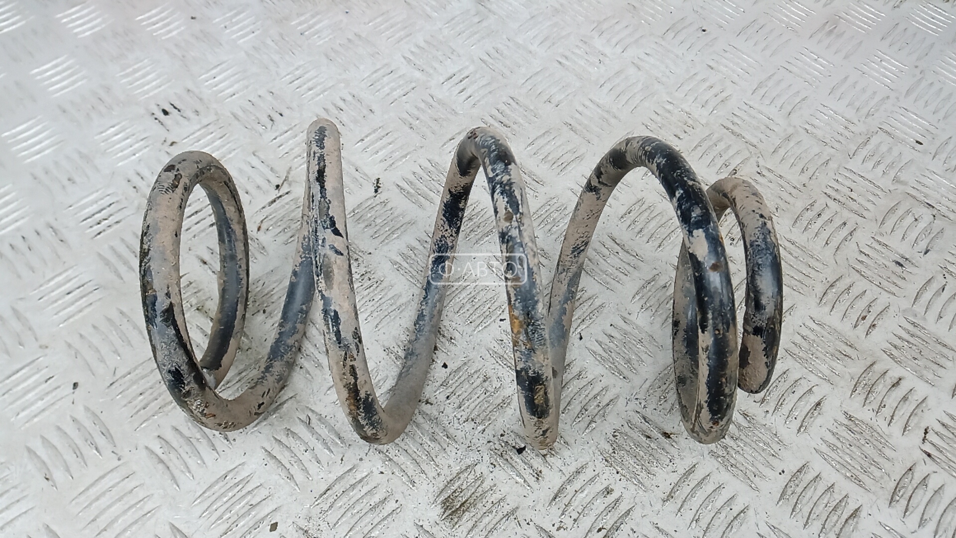 Пружина задняя