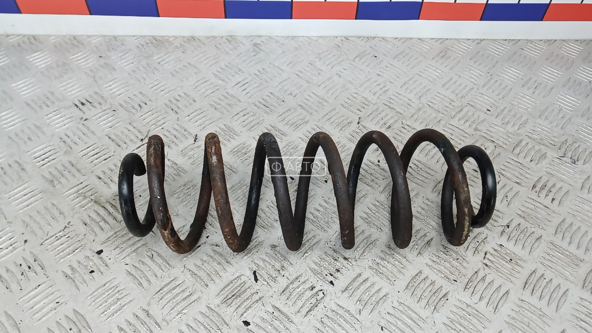 Пружина задняя