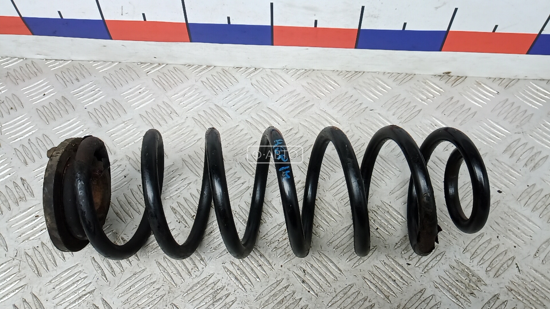 Пружина задняя