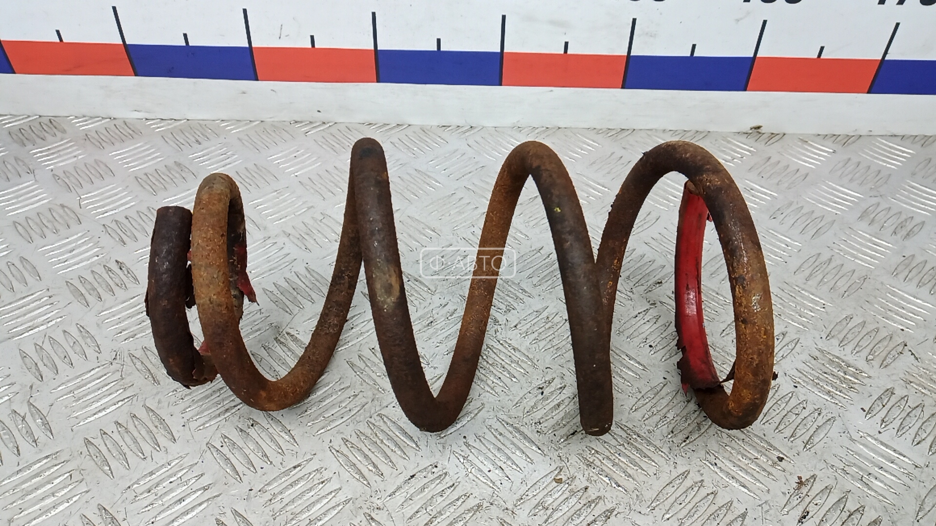 Пружина задняя