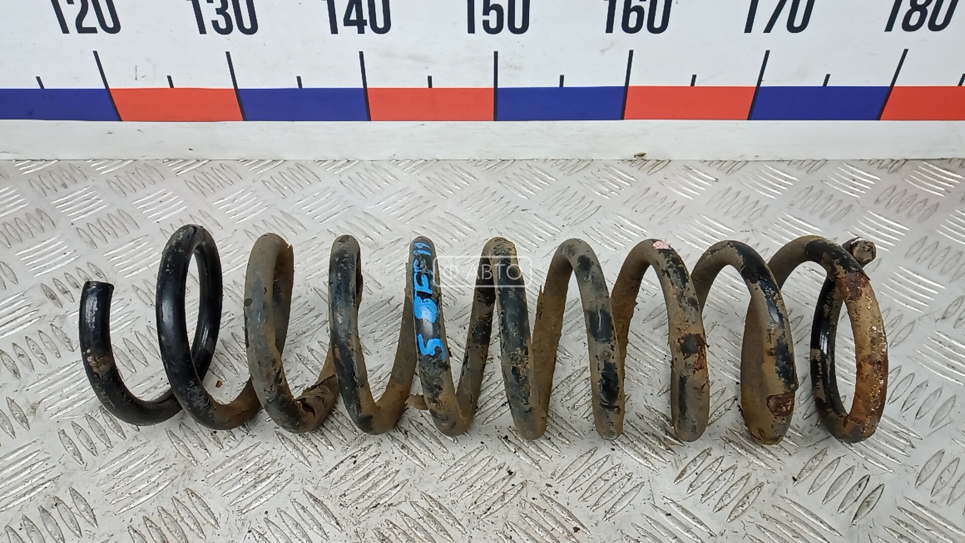 Пружина задняя