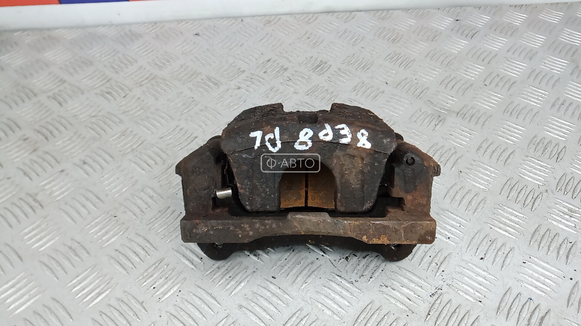 Суппорт тормозной передний левый