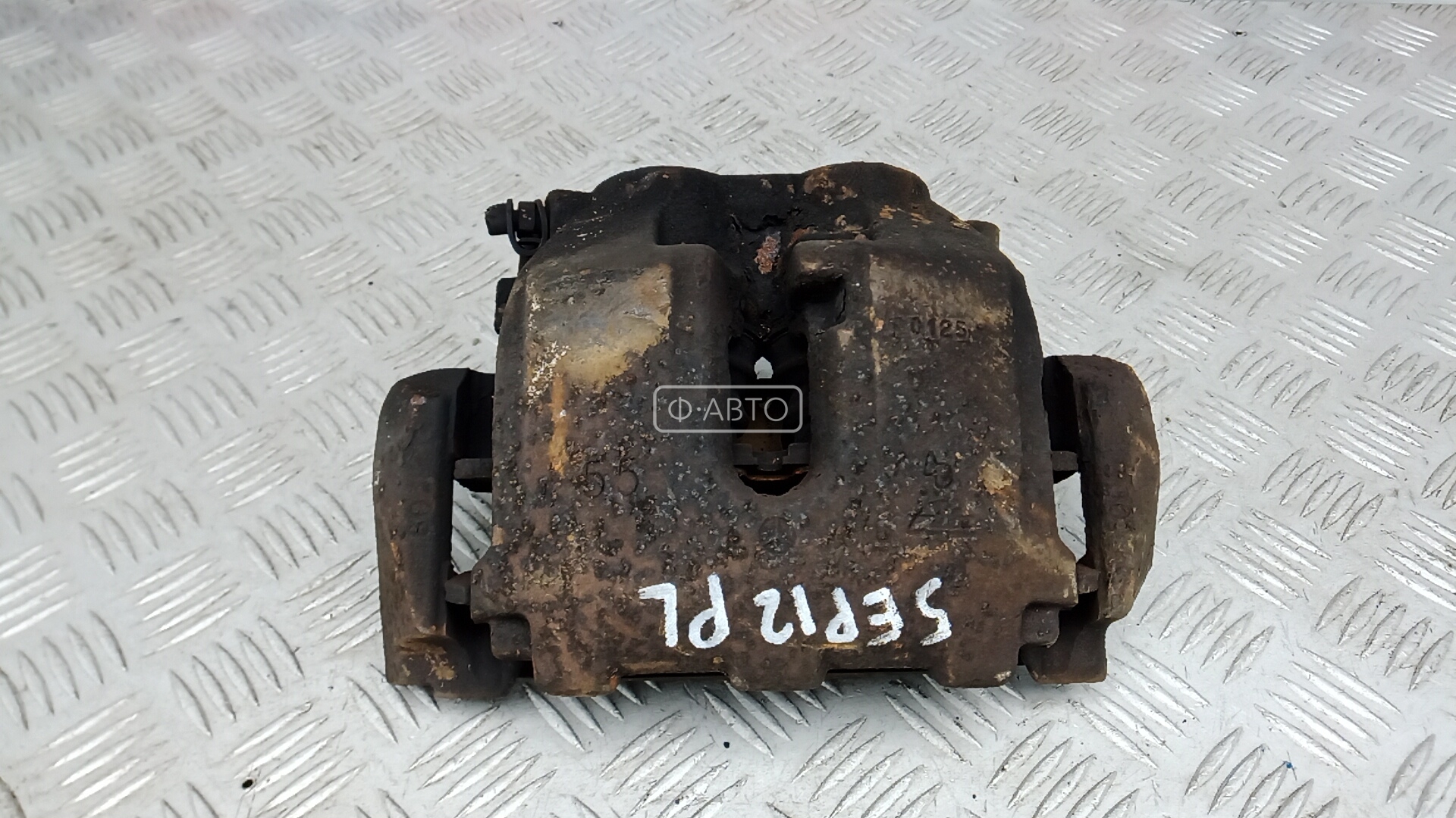 Суппорт тормозной передний левый