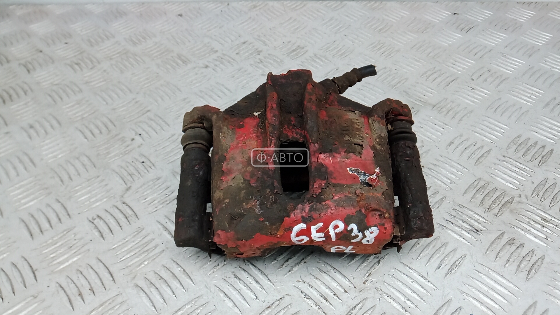 Суппорт тормозной передний левый