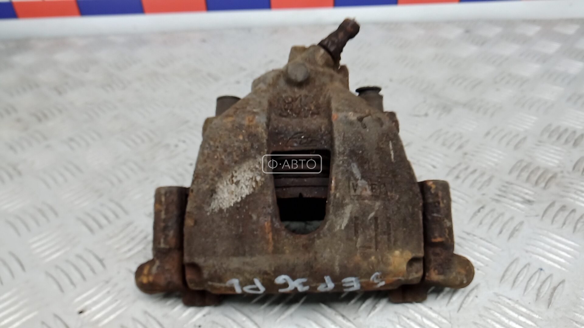 Суппорт тормозной передний левый