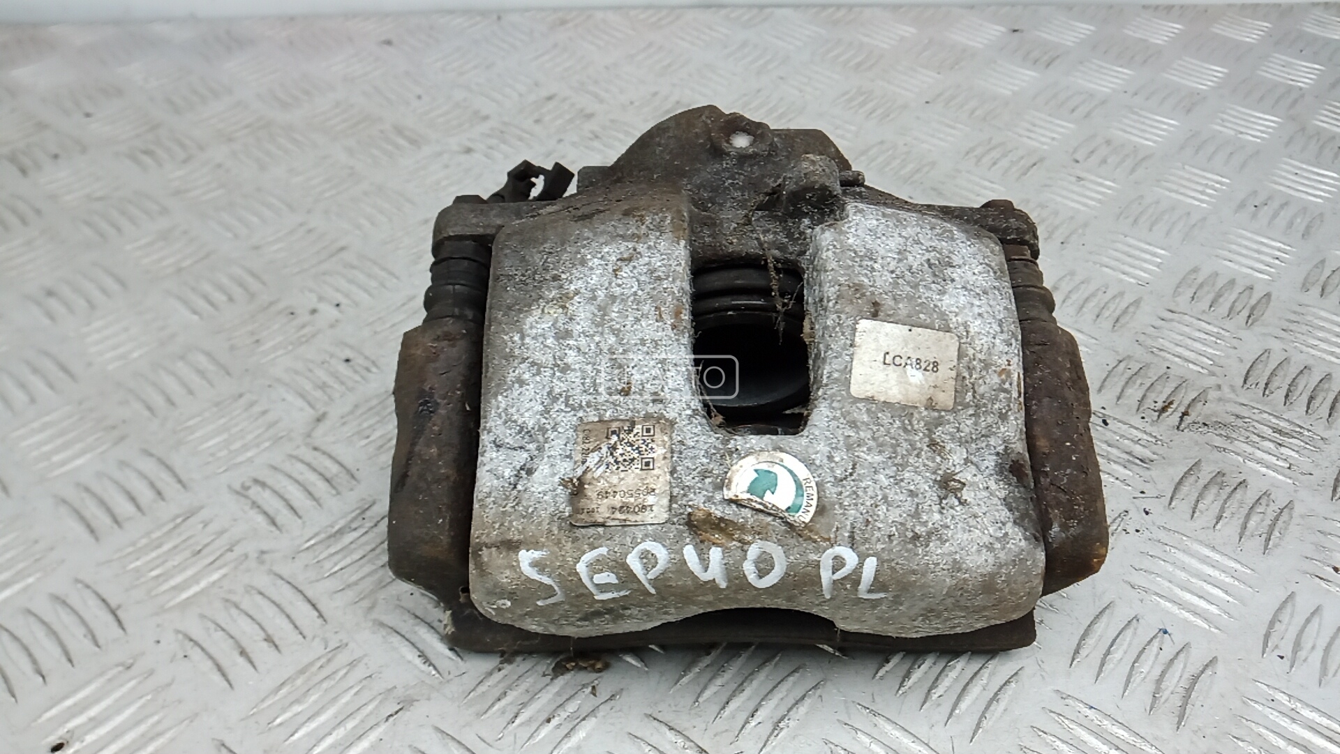 Суппорт тормозной передний левый