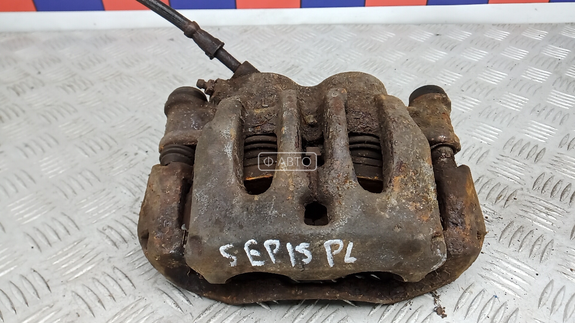 Суппорт тормозной передний левый