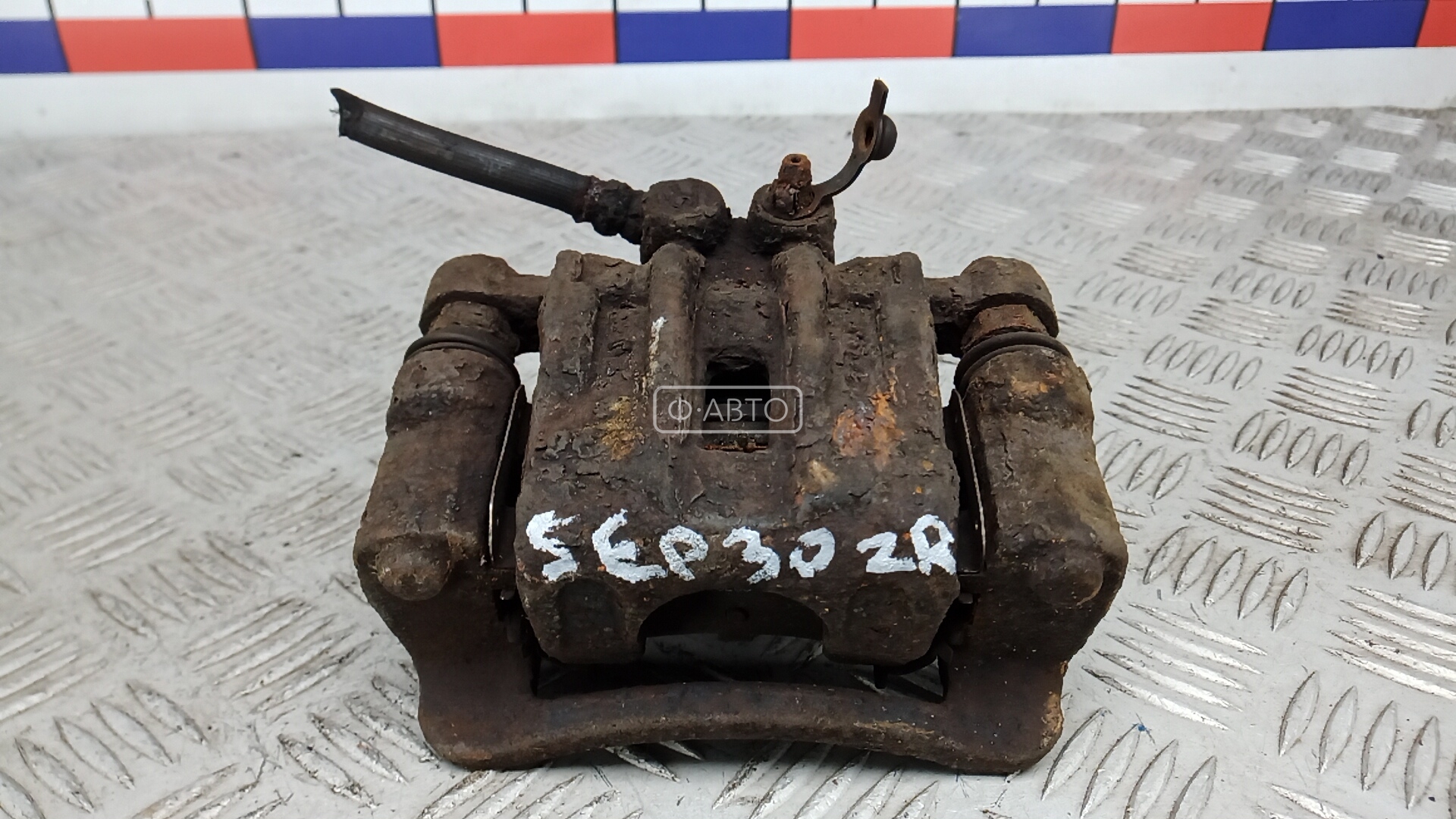 Суппорт тормозной задний правый