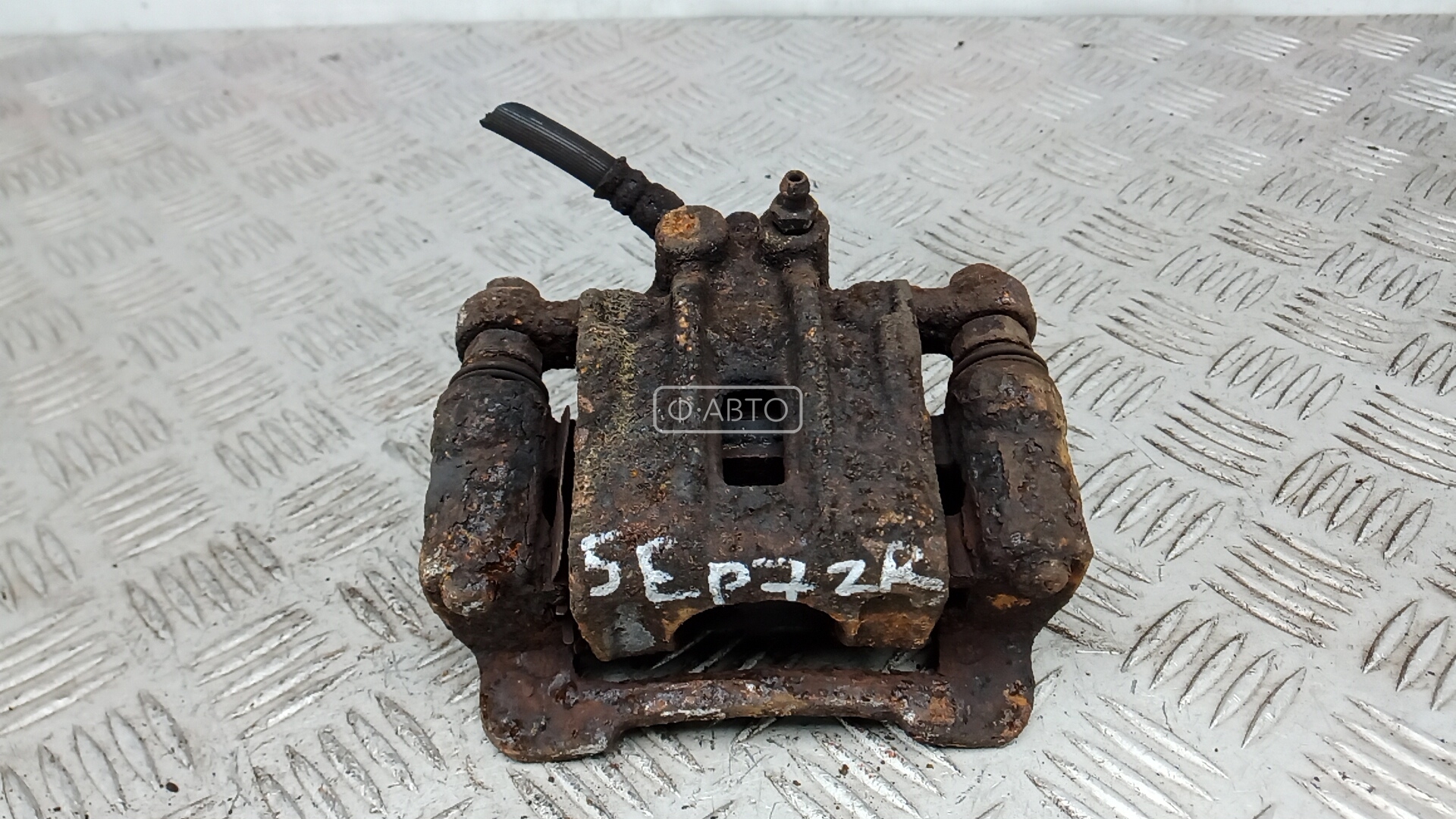 Суппорт тормозной задний правый