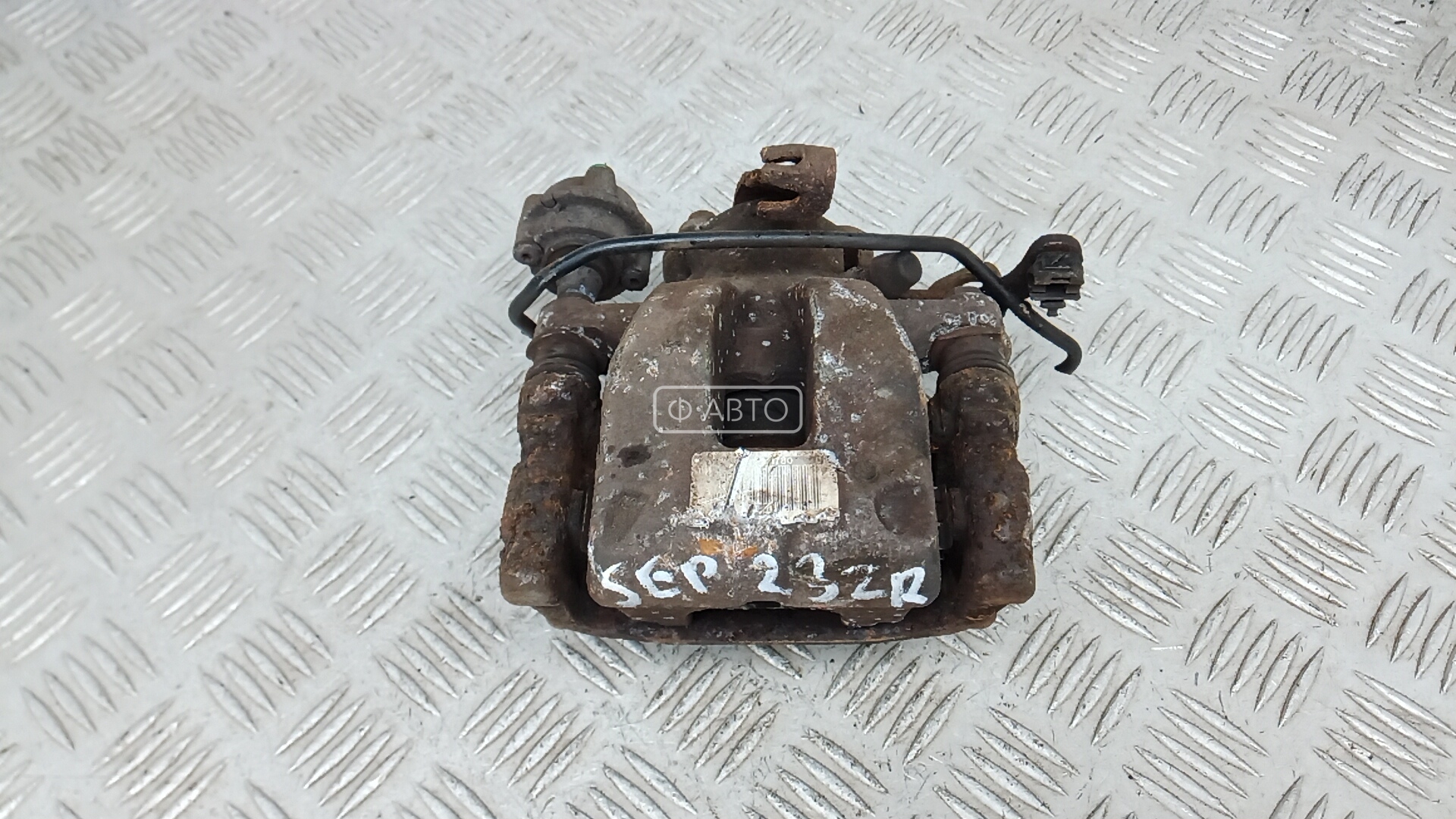 Суппорт тормозной задний правый