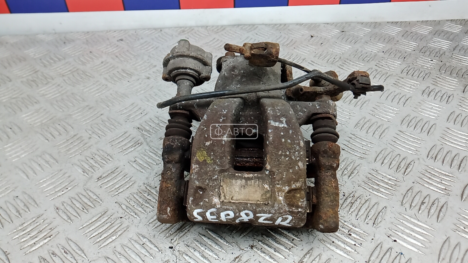 Суппорт тормозной задний правый