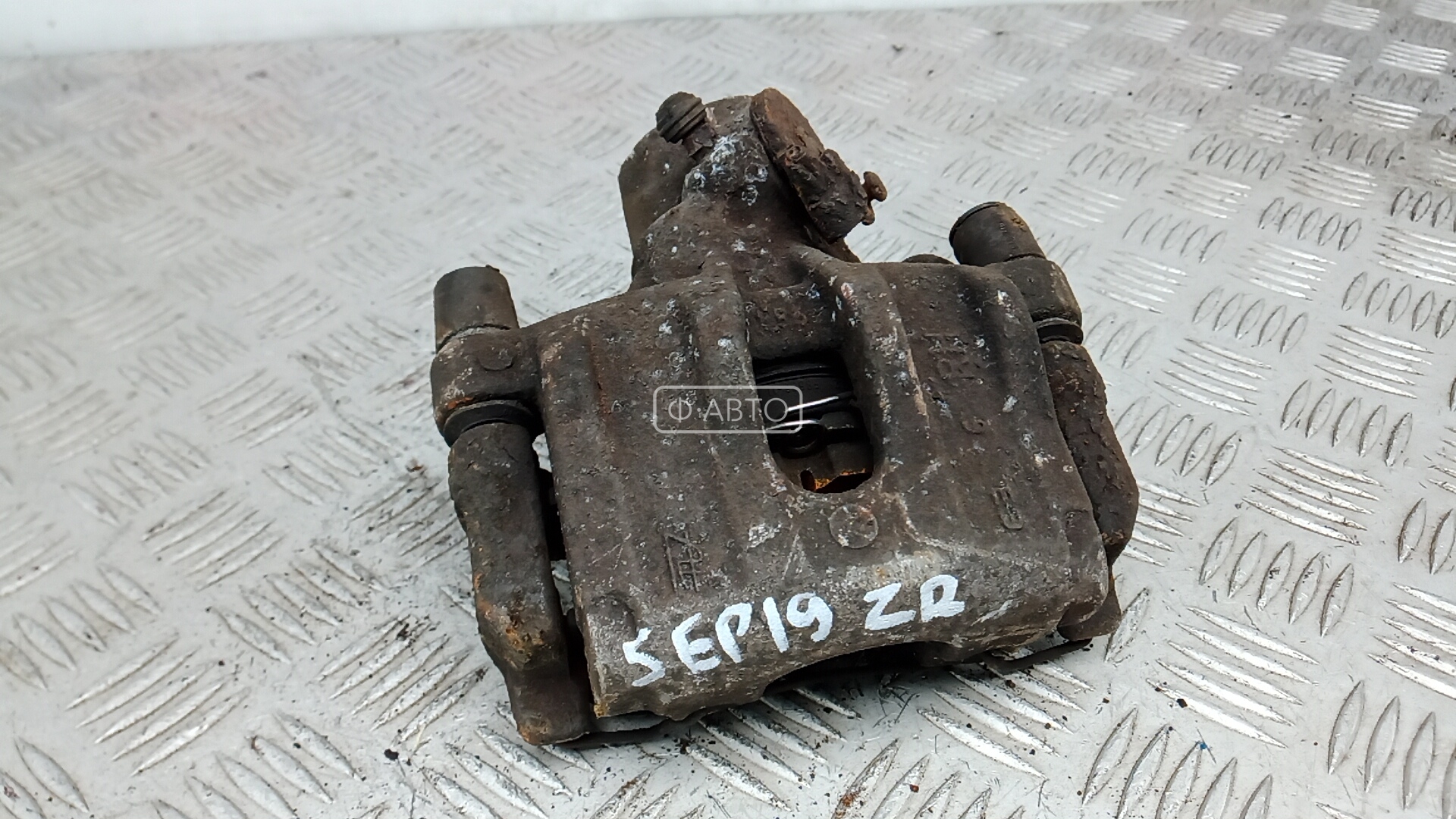 Суппорт тормозной задний правый