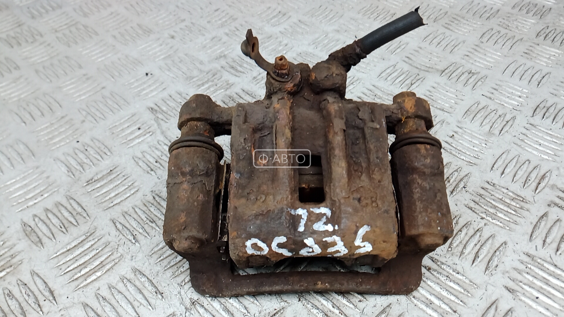 Суппорт тормозной задний левый