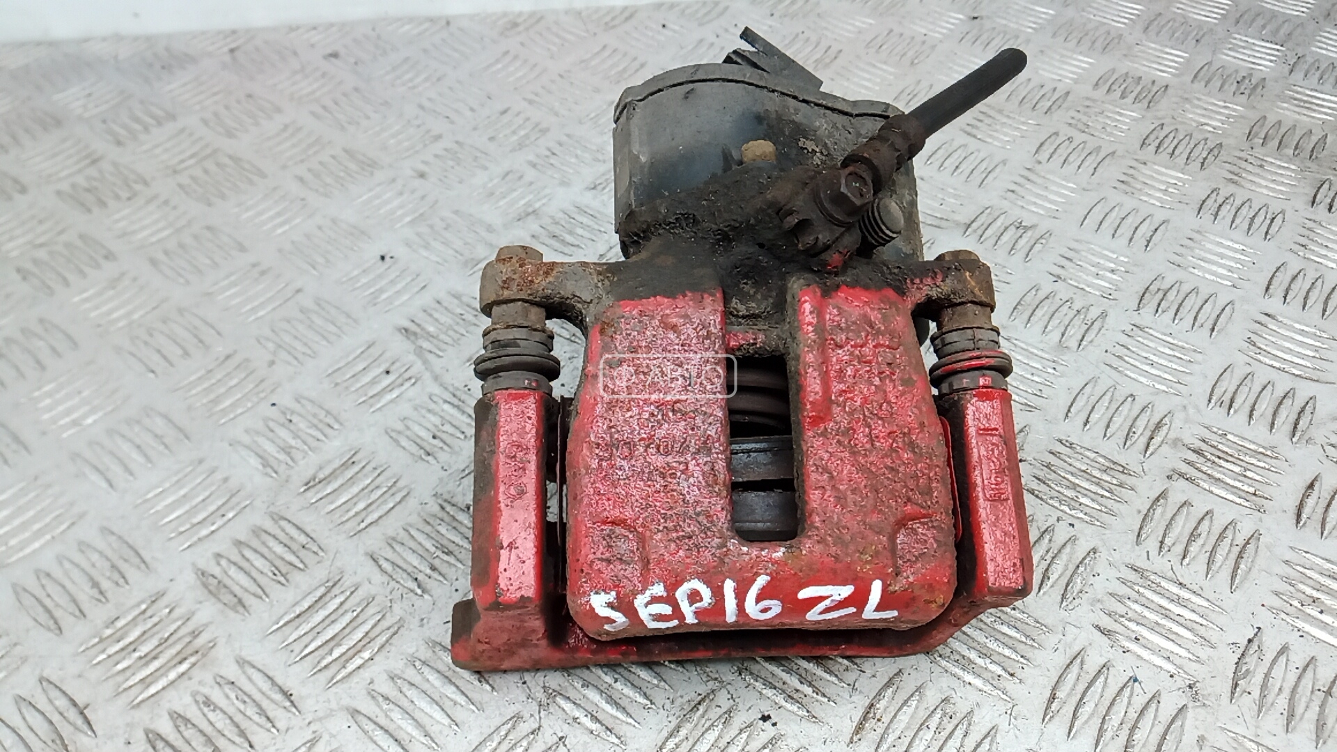 Суппорт тормозной задний левый