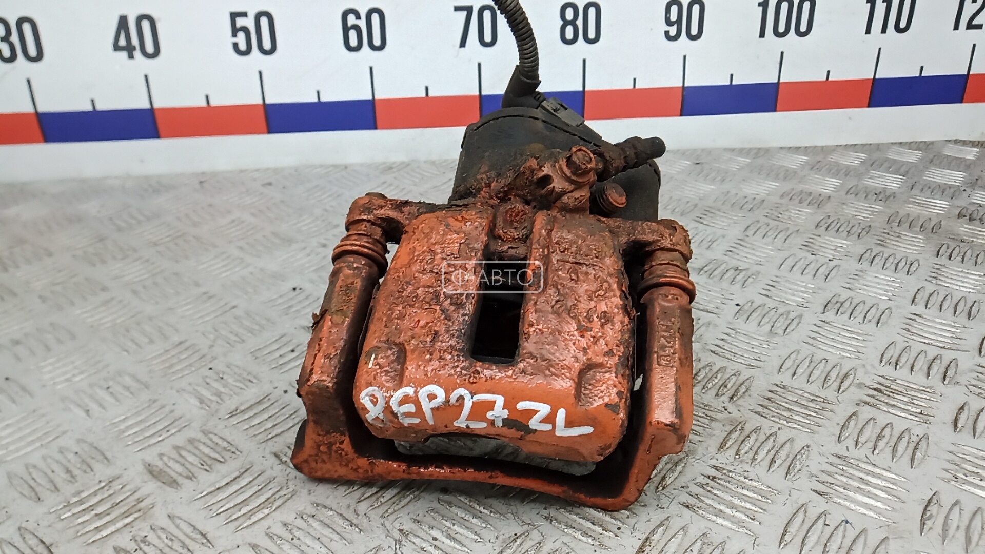 Суппорт тормозной задний левый