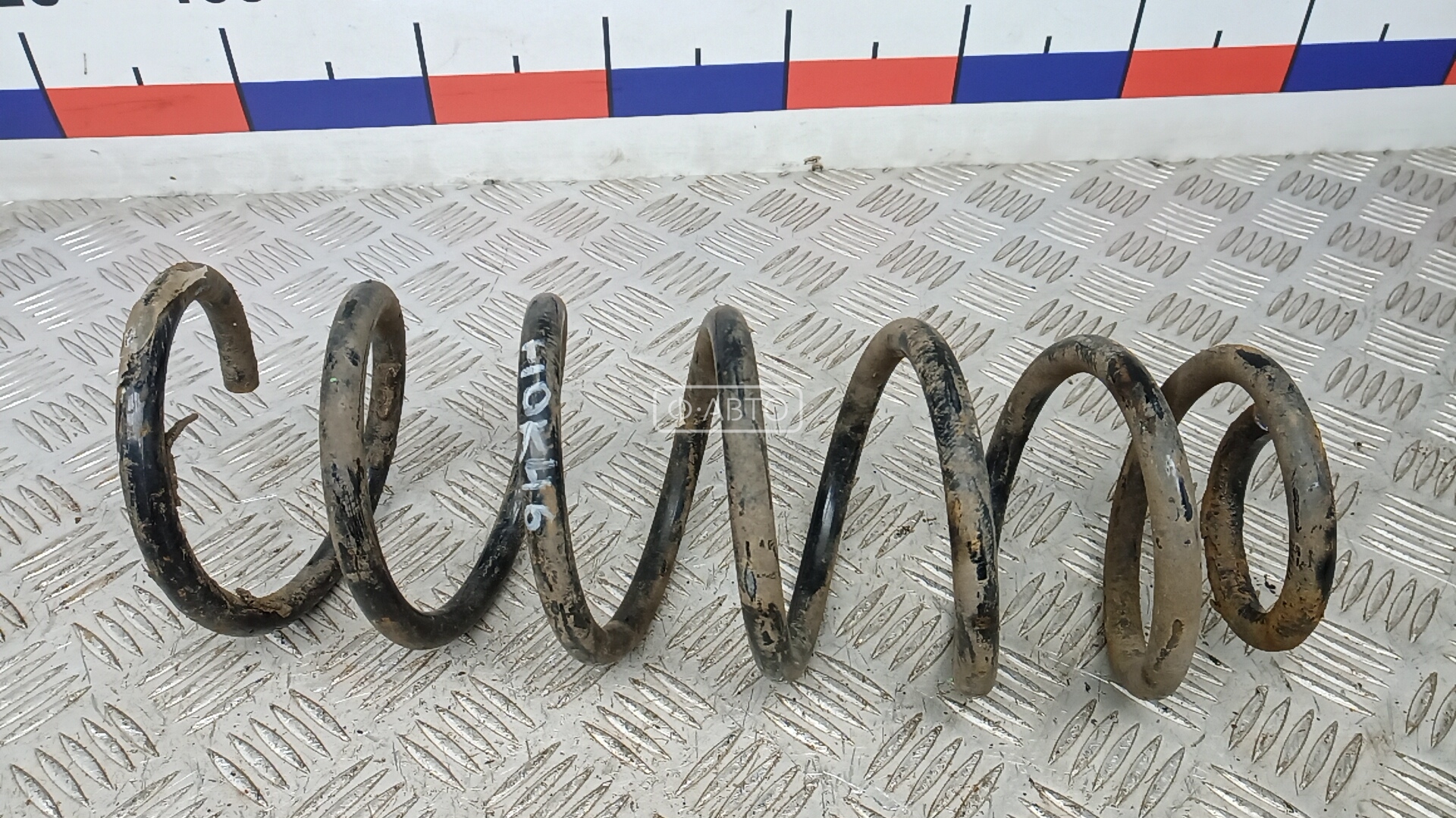 Пружина задняя