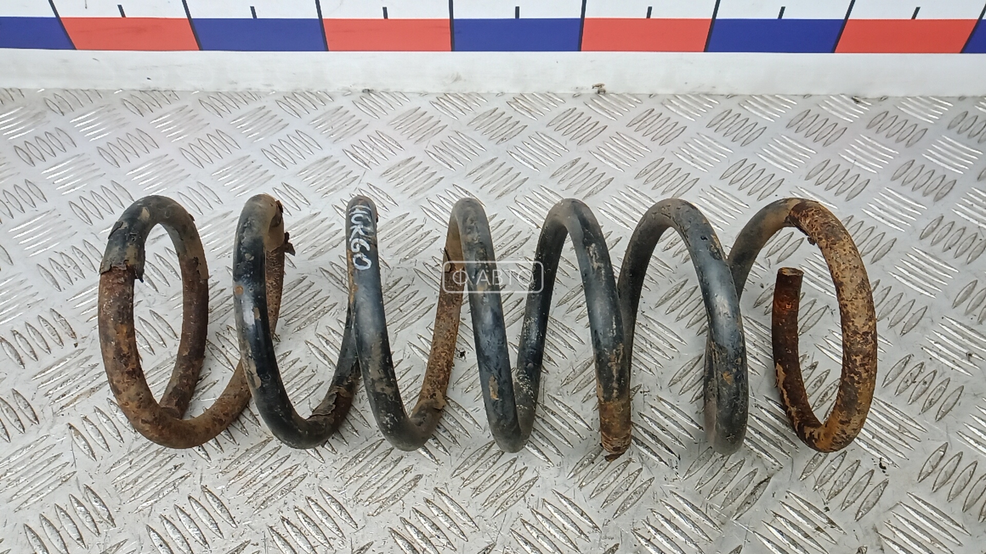 Пружина задняя