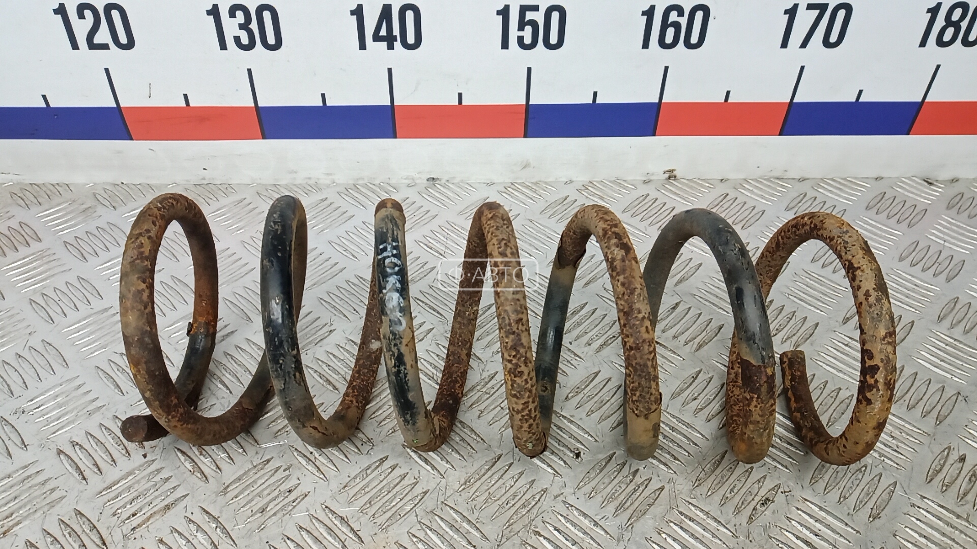 Пружина задняя