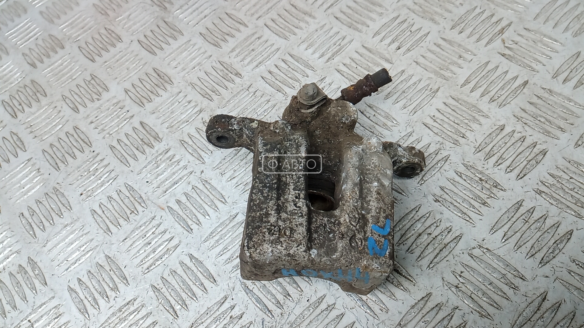 Суппорт тормозной задний левый