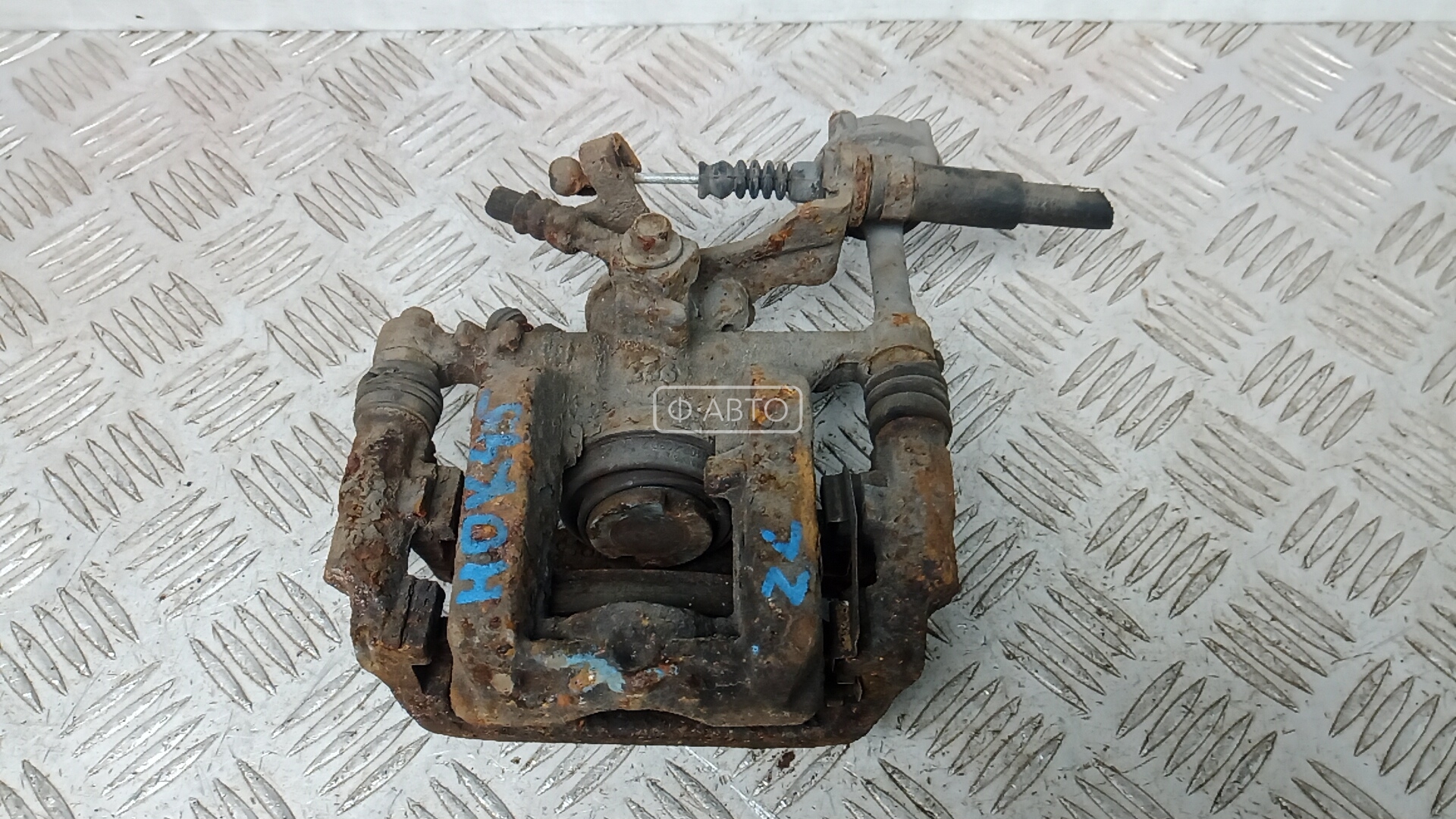 Суппорт тормозной задний левый