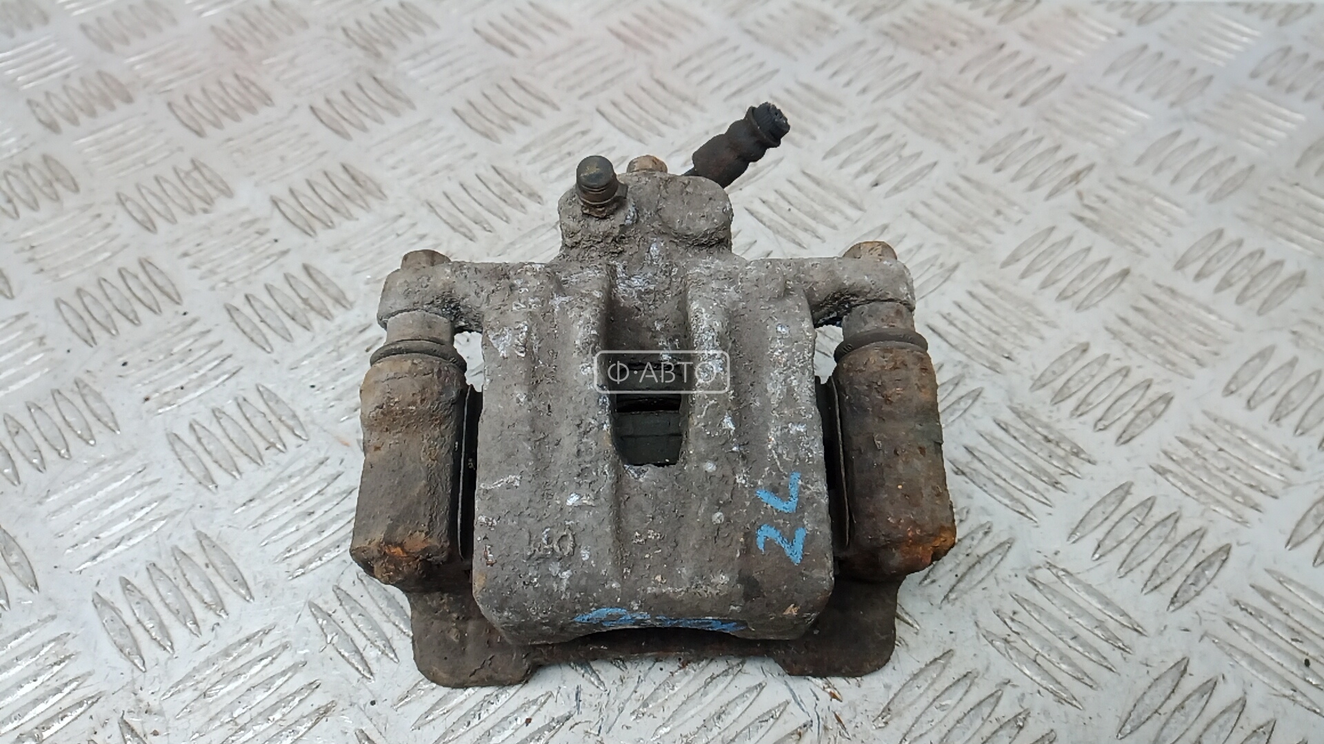 Суппорт тормозной задний левый