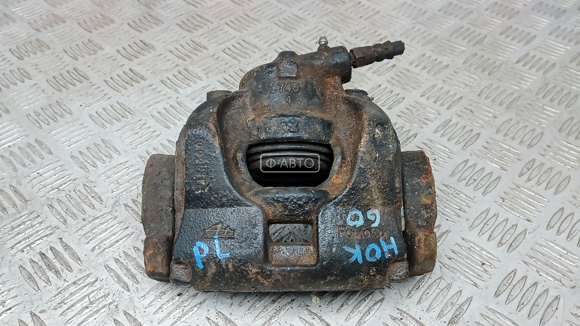 Суппорт тормозной передний левый