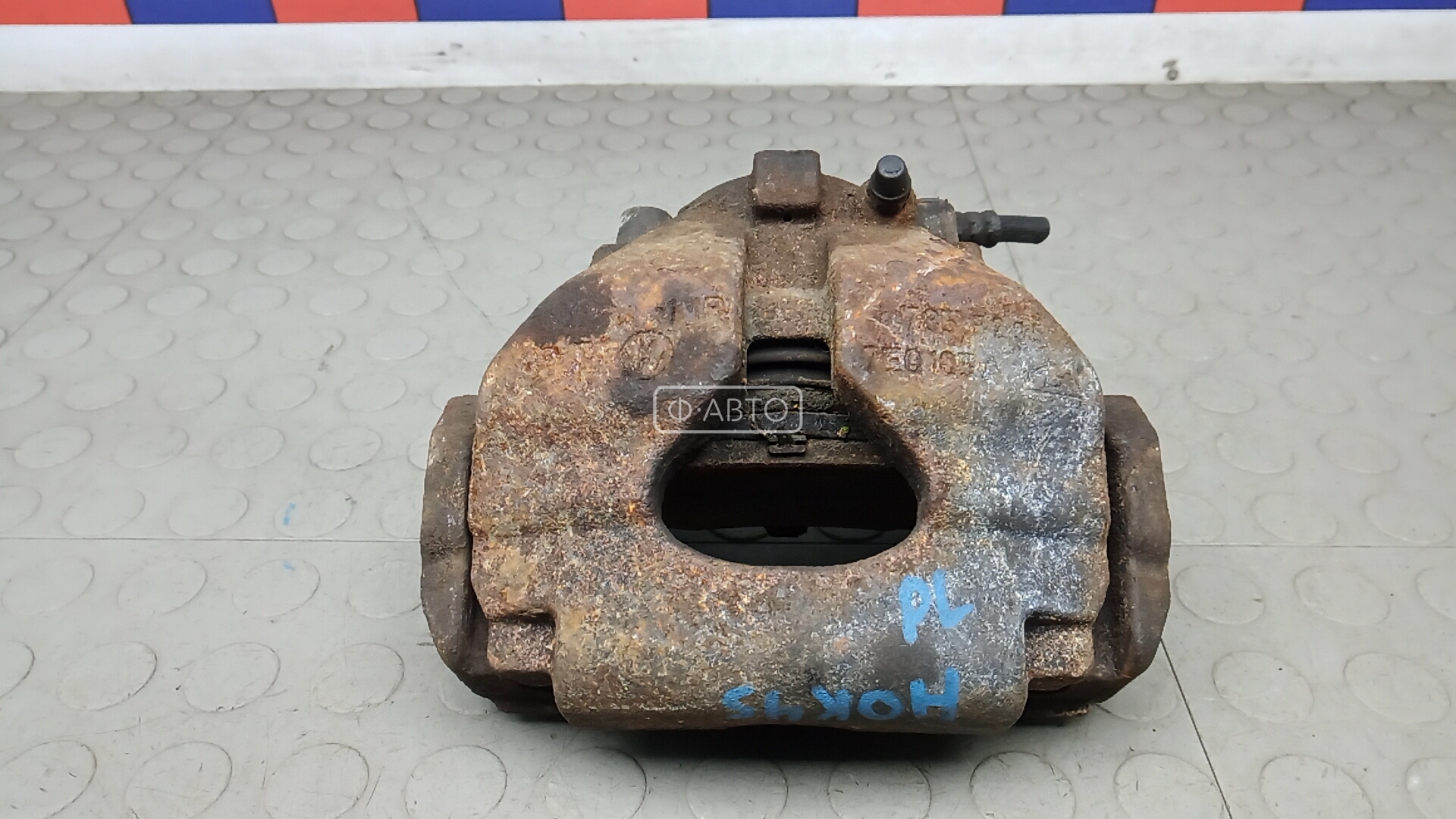 Суппорт тормозной передний левый