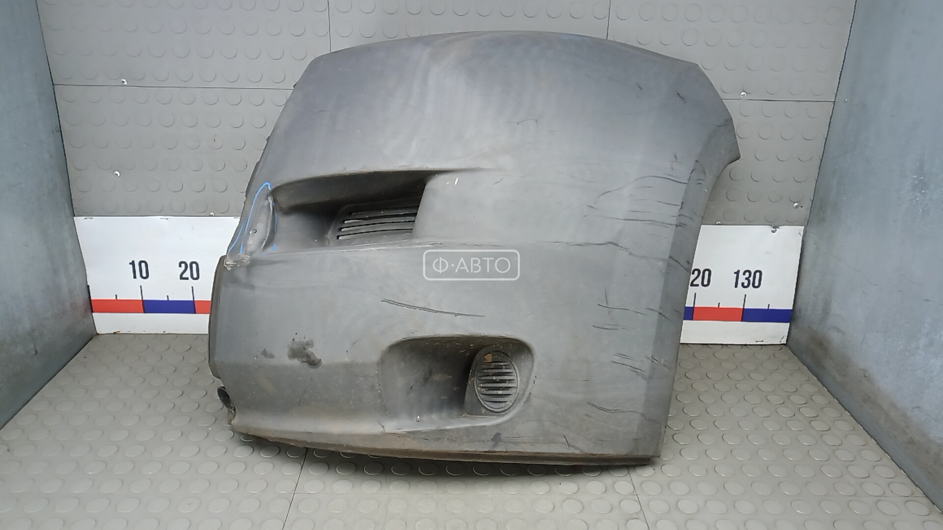 Клык бампера передний левый