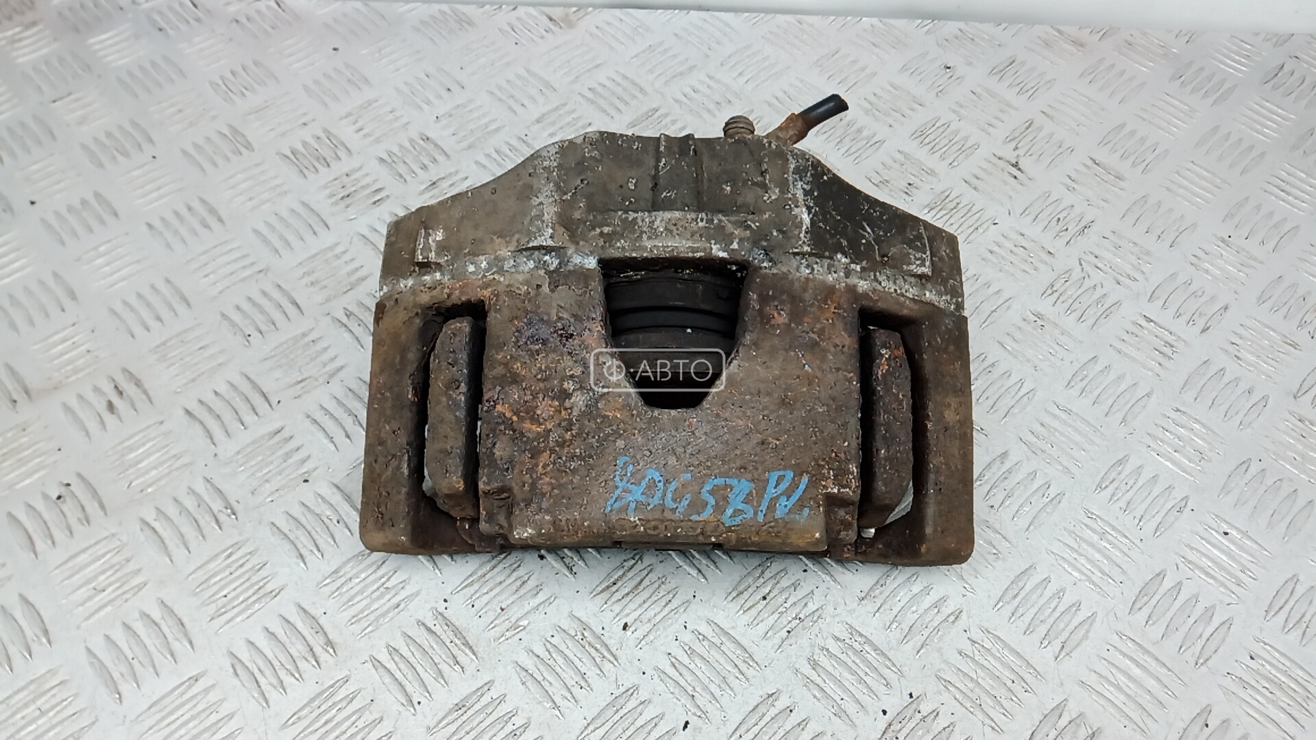 Суппорт тормозной передний левый